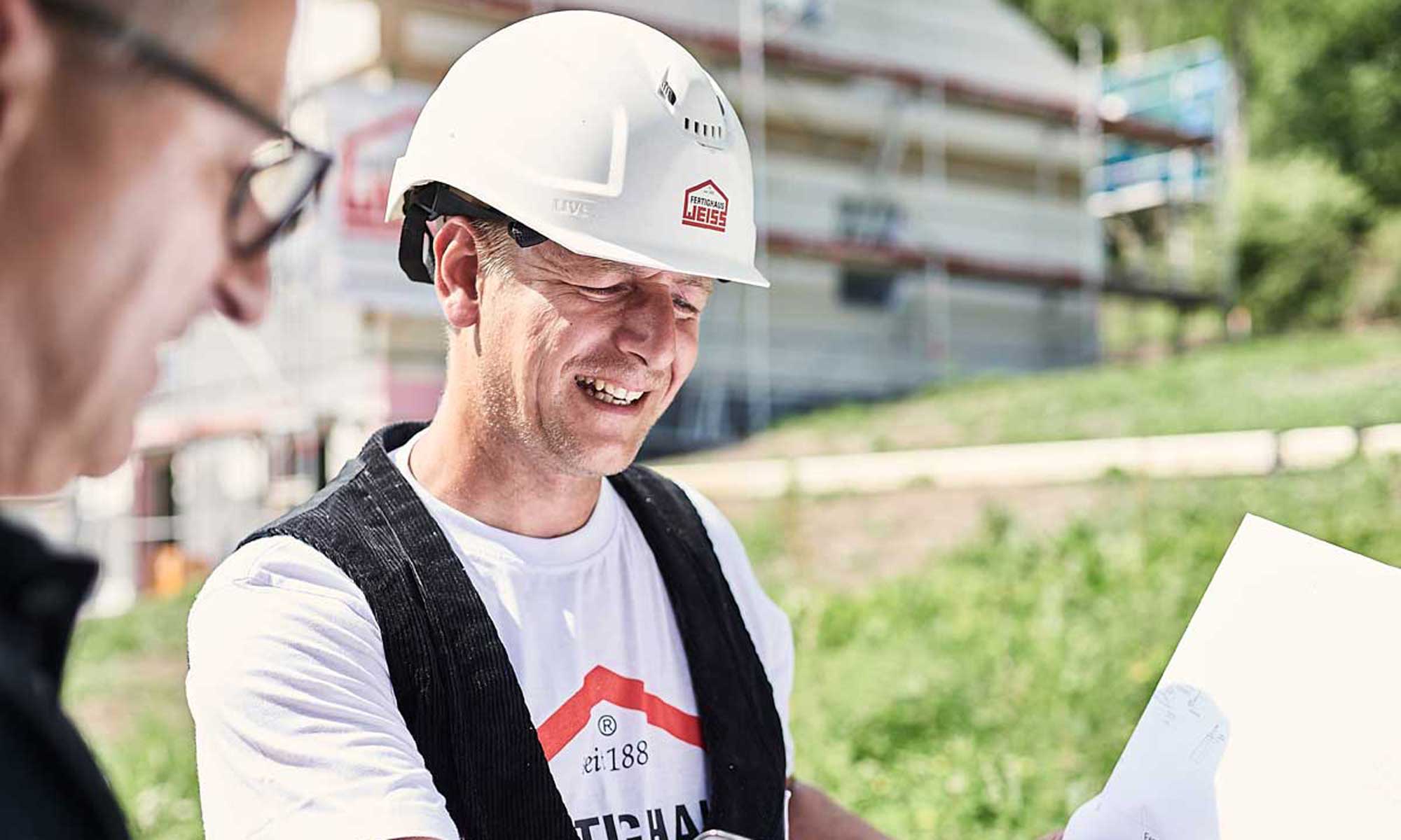 Baustellenbesprechung bei Fertighaus WEISS