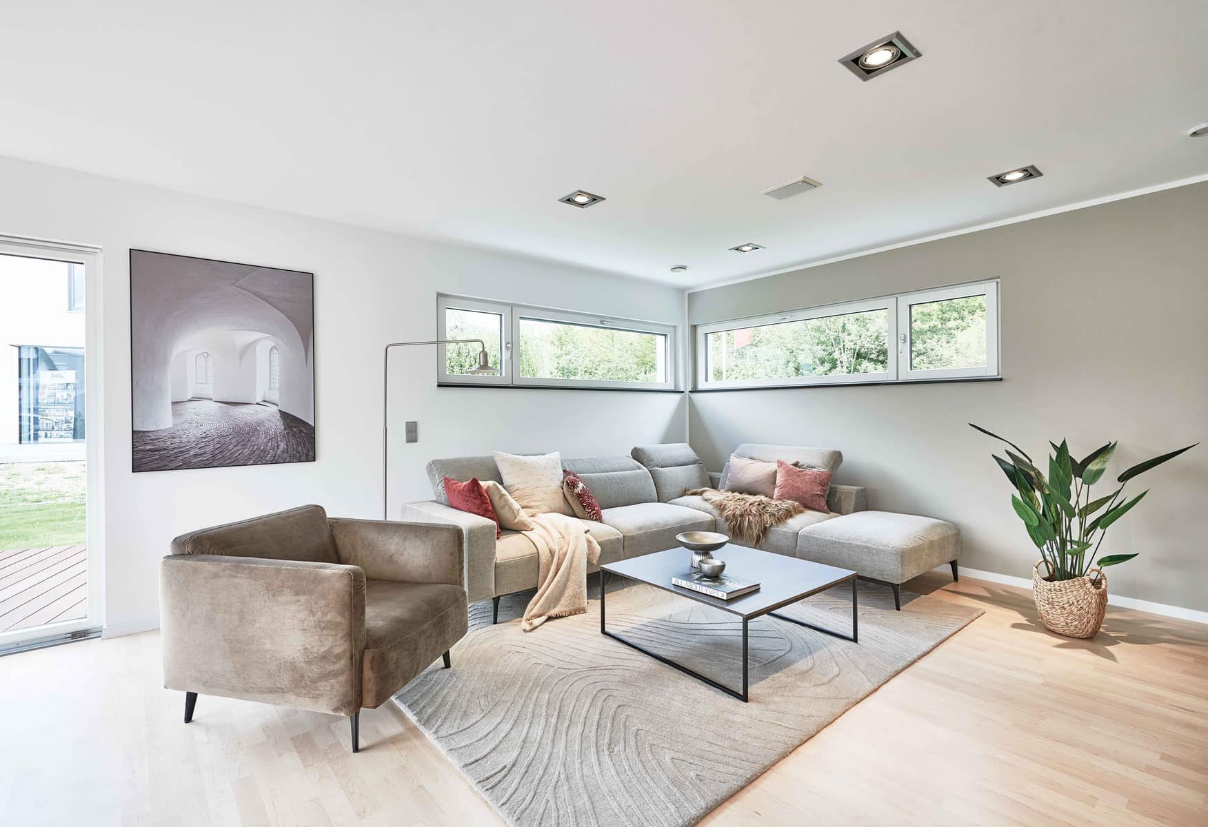 Wohnzimmer Musterhaus Erlangen von Fertighaus WEISS